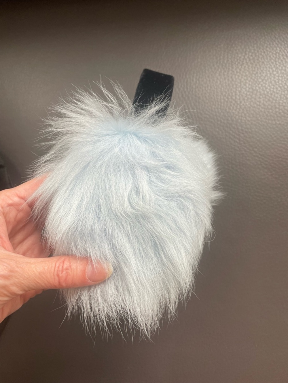 Pologeorgis real fur earmuffs and Black Pouch with Gold Logo